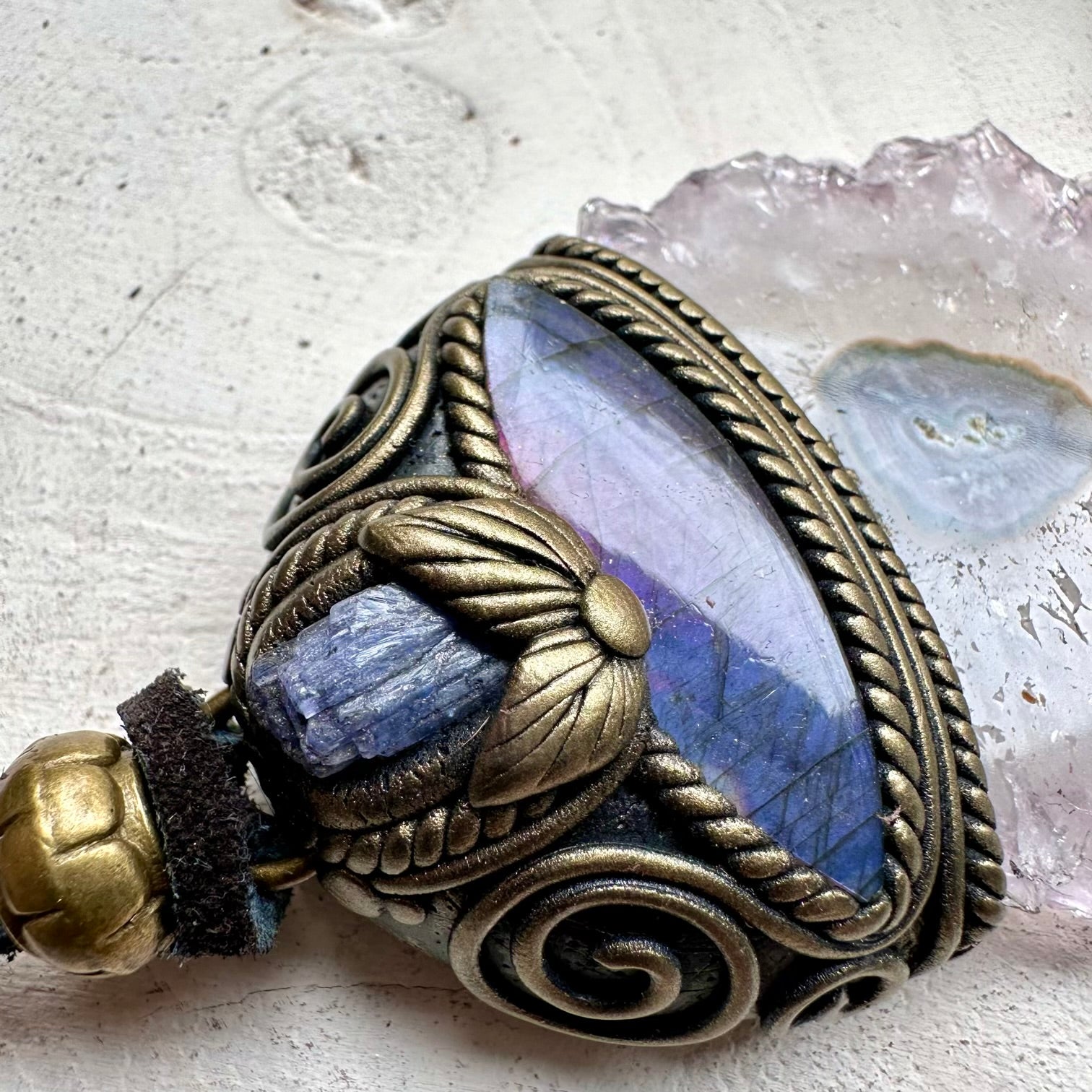 Natural crystal jewelry necklace with amethyst stalactite and tanzanite