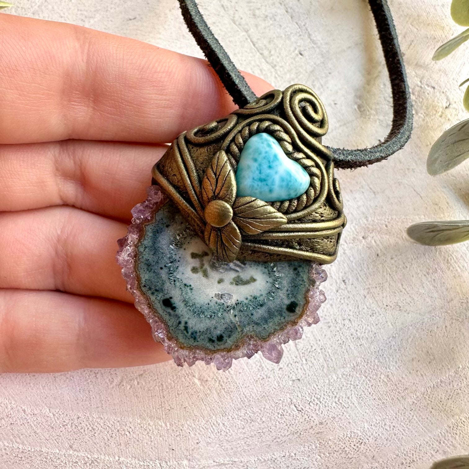 One of a kind crystal necklace with a natural Amethyst Stalactite and blue Larimar Heart.
