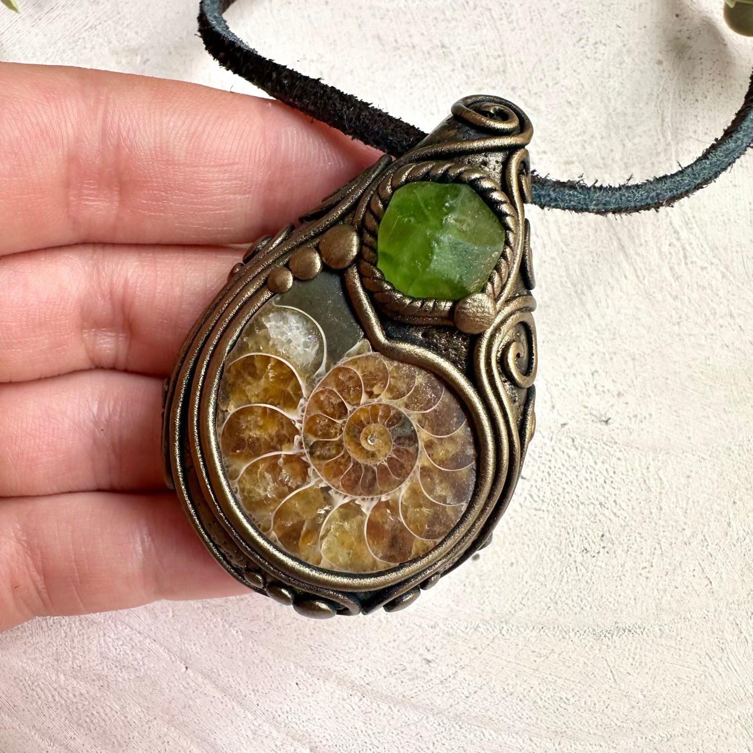 Ammonite and peridot crystal jewelry necklace with earthy healing gemstone and bohemian style
