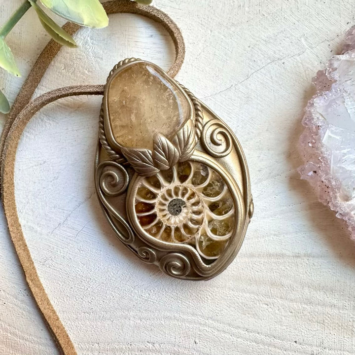 Natural ammonite fossil paired with citrine in a necklace