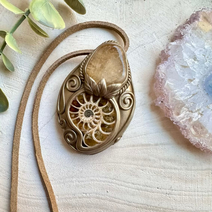 Energy pendant with ammonite fossil and citrine