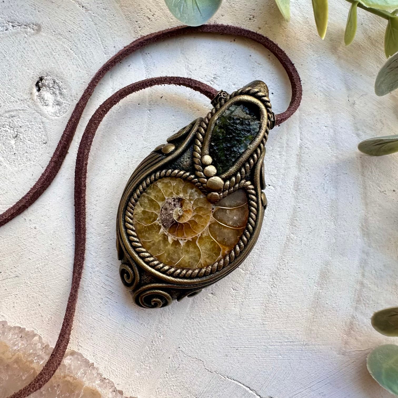 Healing crystal pendant with moldavite and ammonite
