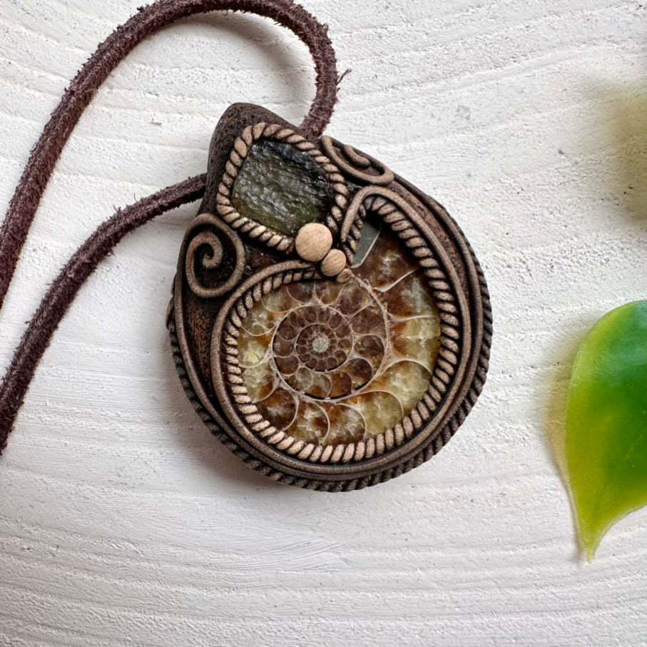 Statement unisex necklace featuring Moldavite and Ammonite