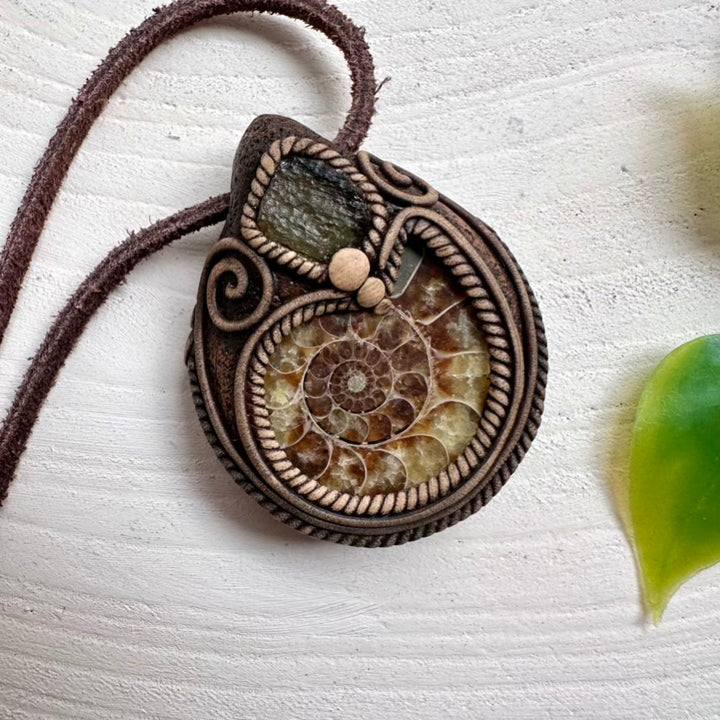 Statement unisex necklace featuring Moldavite and Ammonite