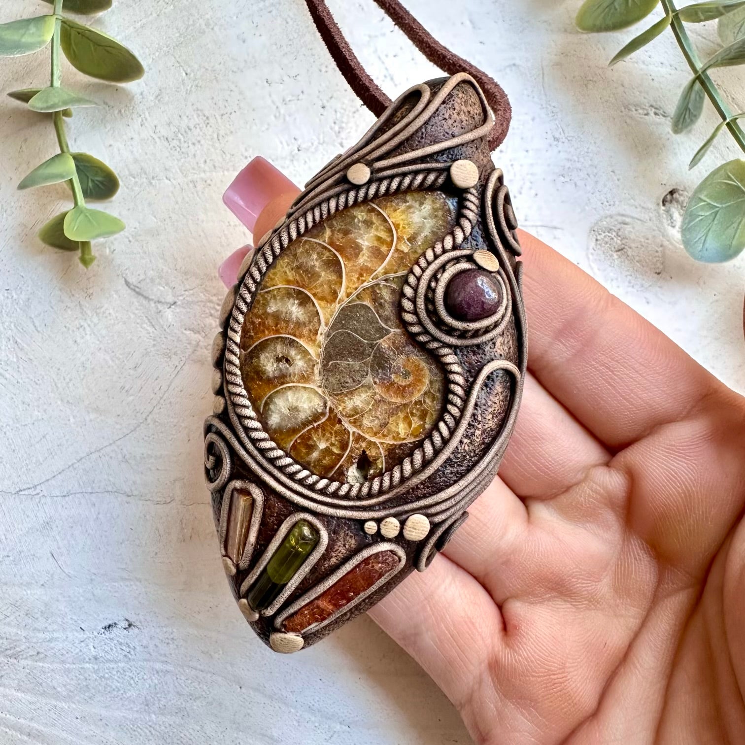 Ammonite with red garnet orange kyanite green tourmaline and imperial topaz pendant necklace