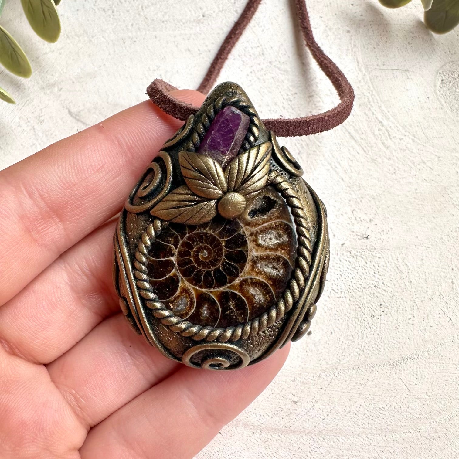 Handmade Ammonite and Ruby necklace with healing gemstone pendant for spiritual protection and passion energy.