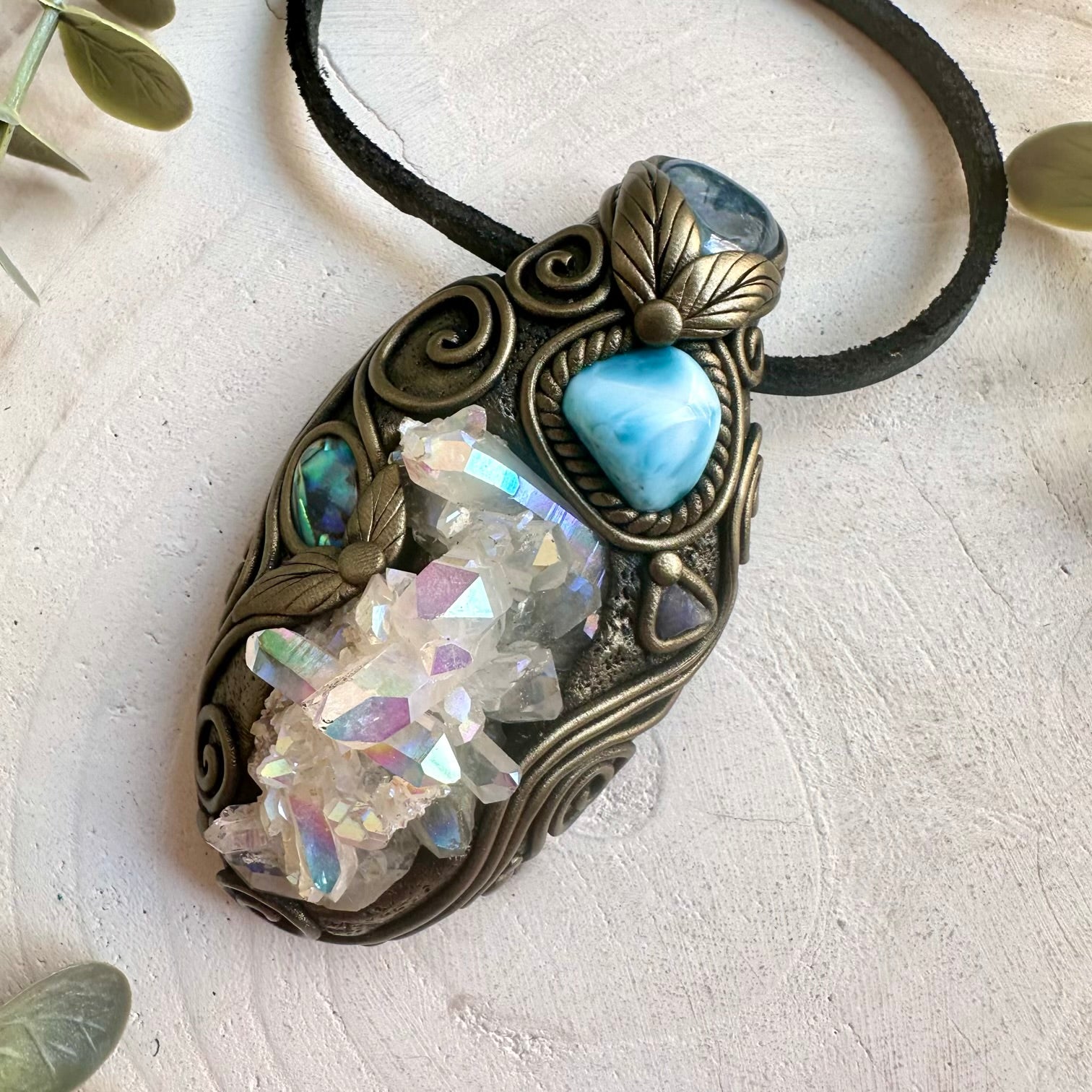 Handmade Angel Aura Quartz Cluster pendant necklace with Aqua Aura Quartz, Larimar, Abalone Seashell and Raw Tanzanite.