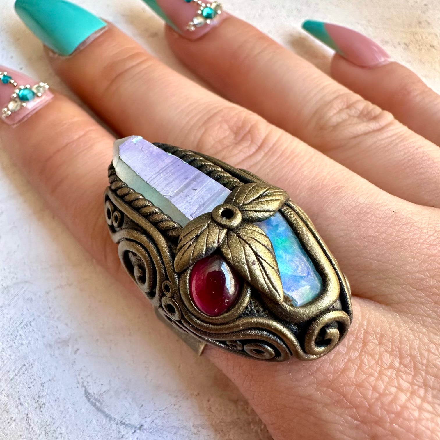 Angel aura quartz with raw Ethiopian opal and rhodolite garnet ring