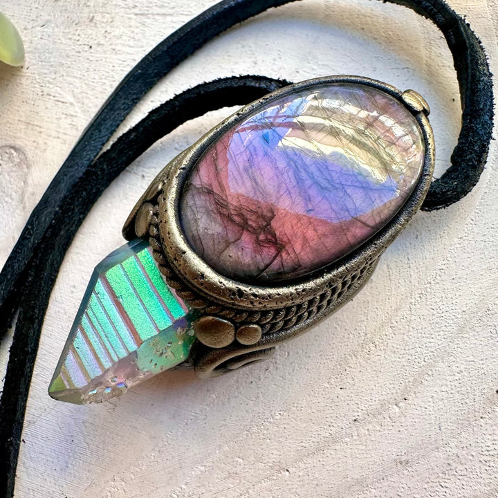 Natural angel aura quartz paired with labradorite in a pendant