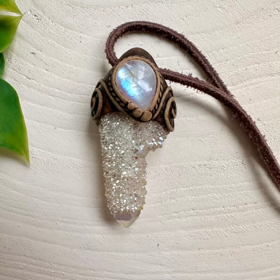 Angel Aura Spirit Quartz crystal pendant paired with Rainbow Moonstone