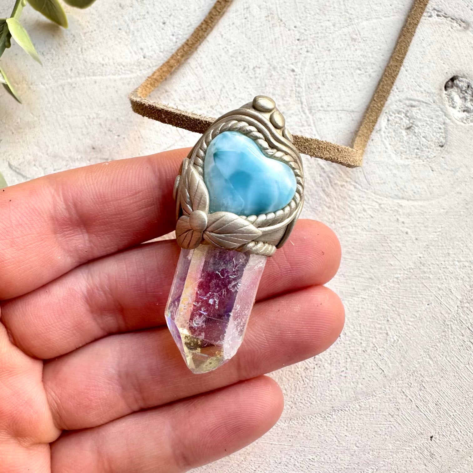 Crystal necklace designed for love healing and light energy with larimar heart and angel aura quartz