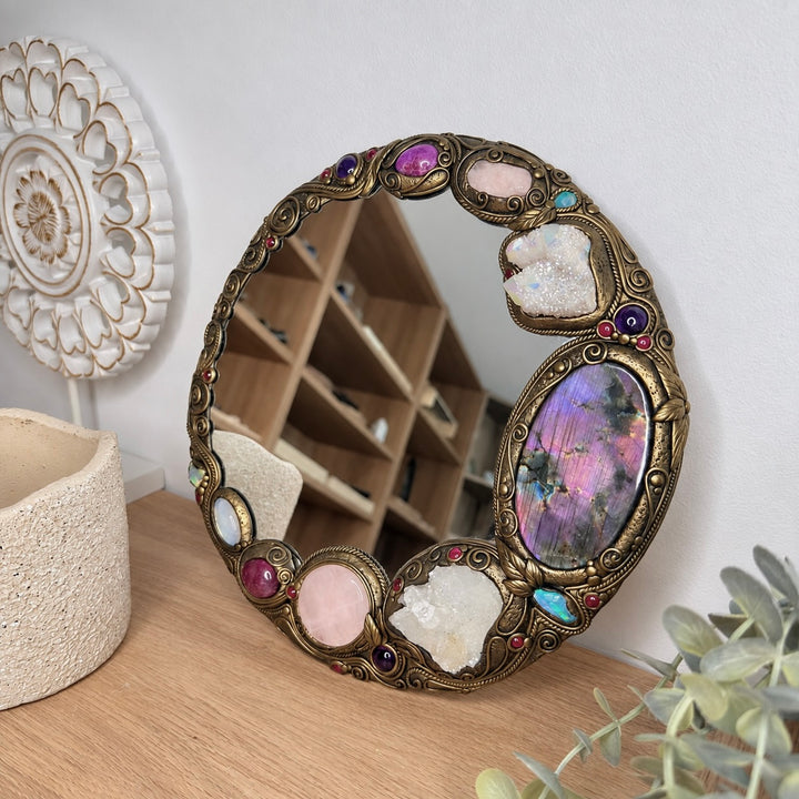 Handmade metaphysical home decor mirror with Rose Quartz, Morganite, Ruby, Rhodolite Garnet and Rainbow Moonstone.