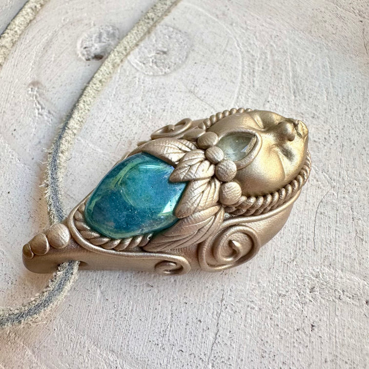 Crystal talisman necklace with aqua aura quartz and blue topaz healing stones