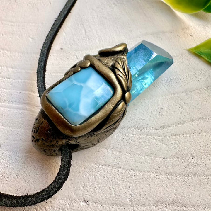 Aqua Aura Quartz crystal pendant paired with Larimar gemstone