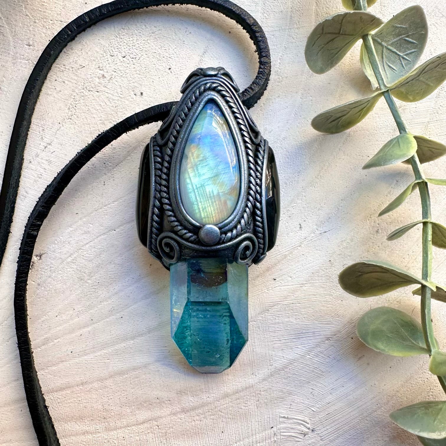 Handmade necklace featuring aqua aura quartz moonstone and black onyx