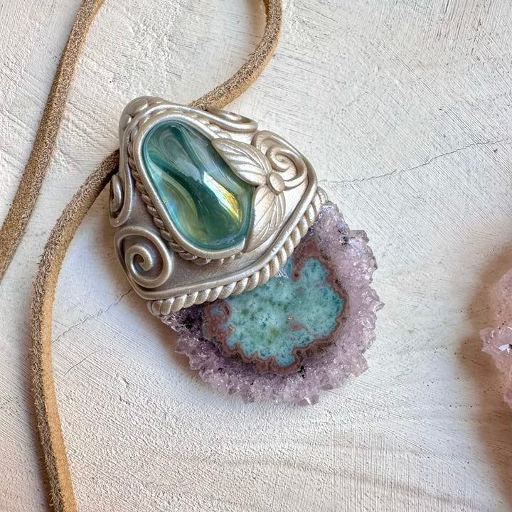 Amethyst stalactite paired with aqua aura quartz in a necklace