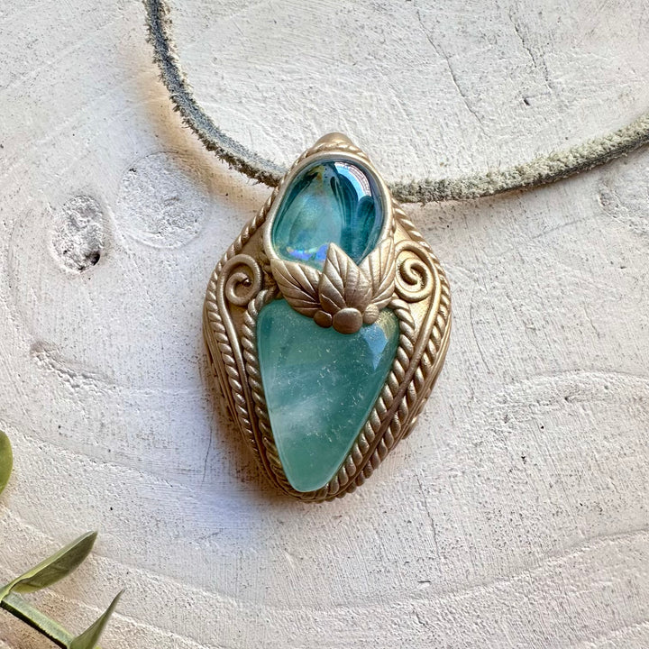 Crystal talisman necklace with aqua aura quartz and aquamarine healing stones