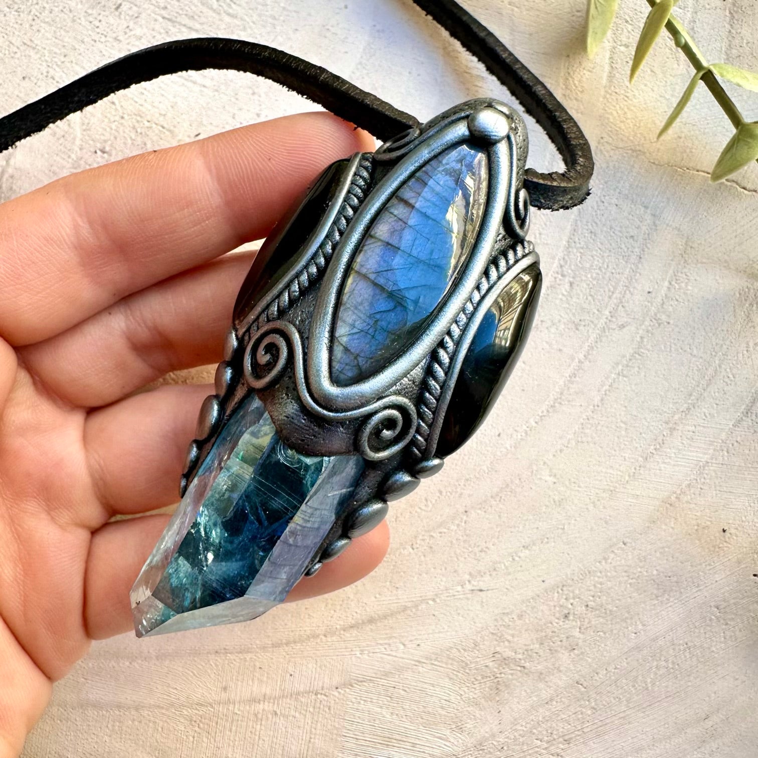 Handmade necklace featuring aqua aura quartz labradorite and black onyx