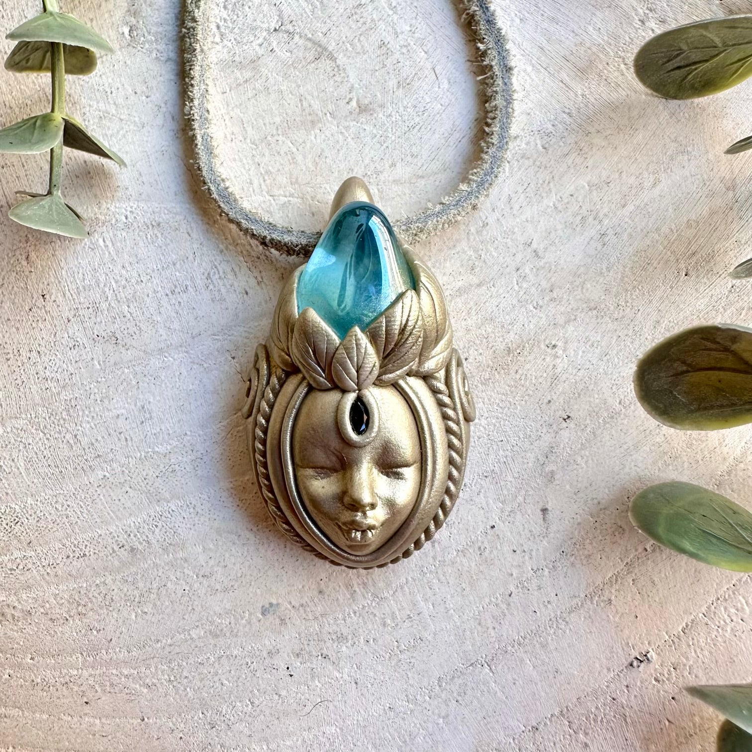Handmade Aqua Aura Quartz and Blue Sapphire Goddess necklace, a one of a kind spiritual gemstone jewelry piece combining luminous blue-toned Quartz with deep natural Sapphire.