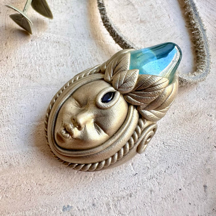 Natural gemstone necklace handcrafted with Aqua Aura Quartz and Blue Sapphire.