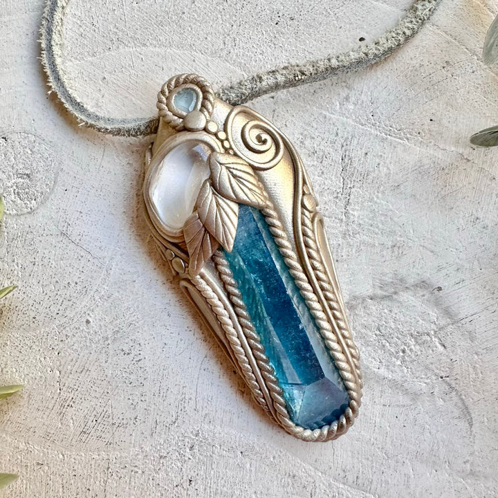 Aqua Aura Quartz with Danburite and Blue Topaz pendant