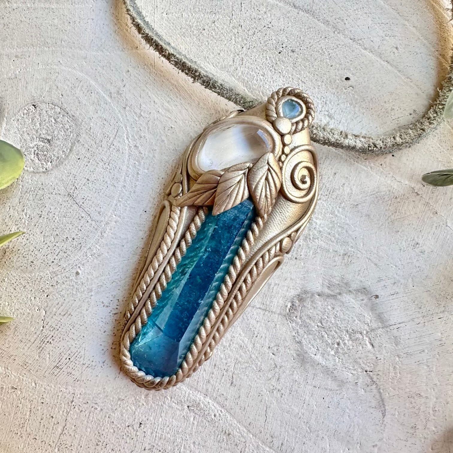 protection amulet crystal necklace with aqua aura quartz danburite and topaz