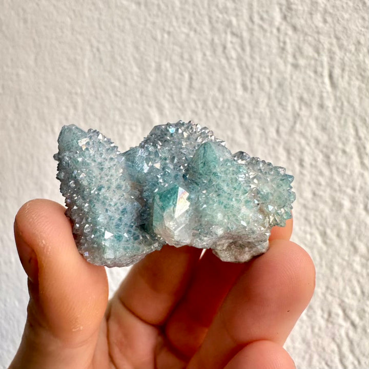 Bright blue Aqua Aura Quartz crystal cluster