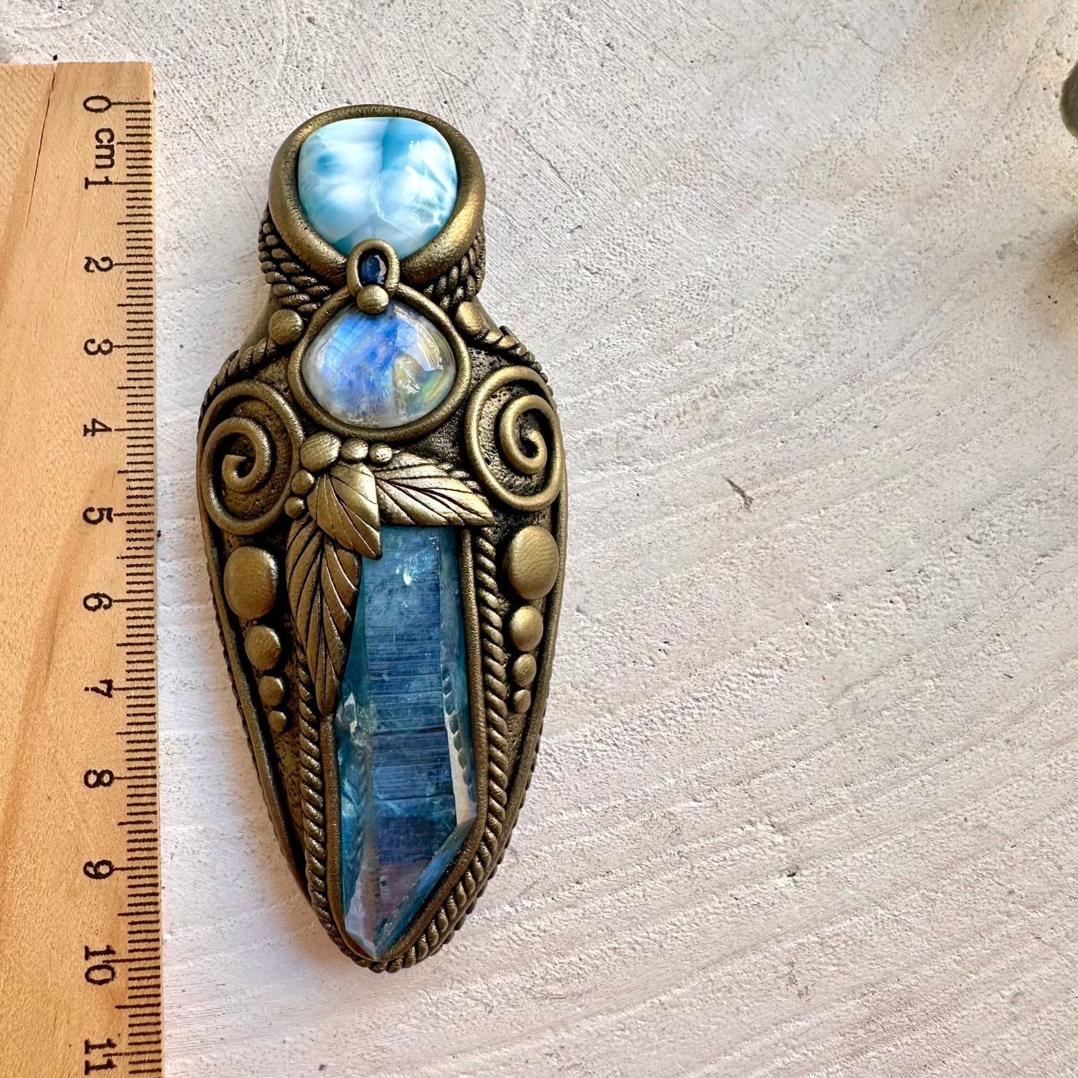 Handmade healing crystal talisman necklace with Aqua Aura Quartz, Larimar, Rainbow Moonstone and Blue Sapphire.
