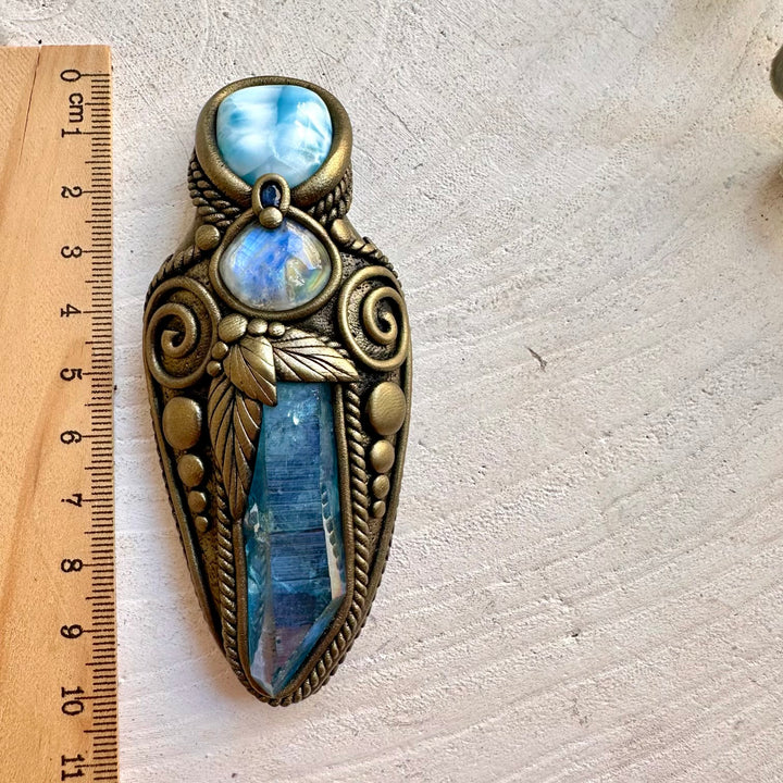 Handmade healing crystal talisman necklace with Aqua Aura Quartz, Larimar, Rainbow Moonstone and Blue Sapphire.