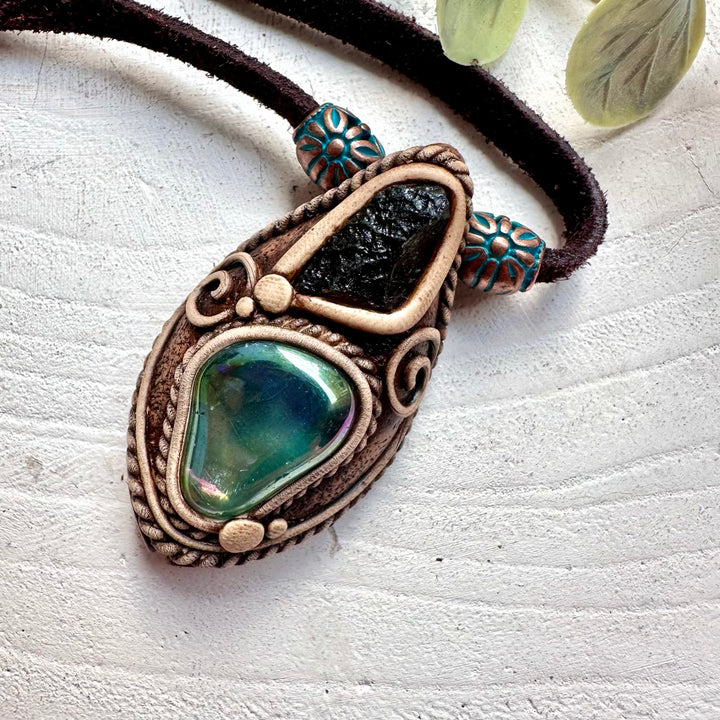 Boho healing crystal necklace featuring Aqua Aura Quartz and Moldavite.