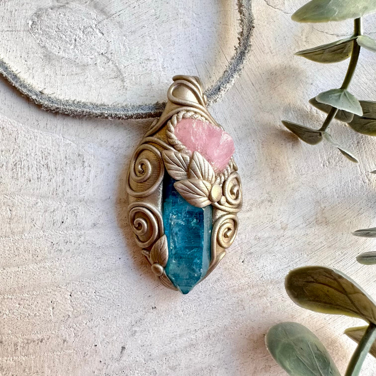 Handmade healing jewelry showcasing Aqua Aura Quartz with delicate pink Morganite.