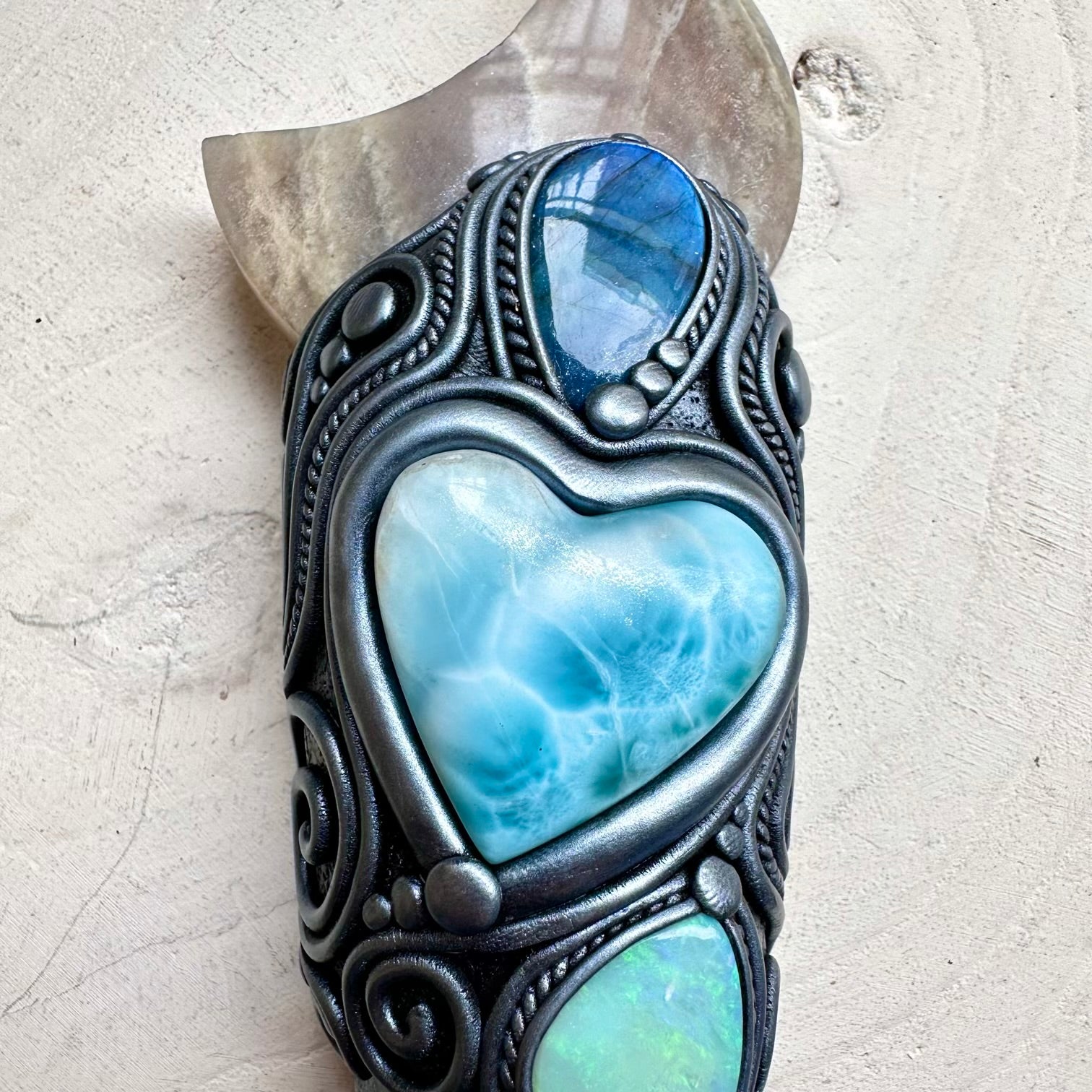 Energy healing wand for witch with aura quartz and gemstones