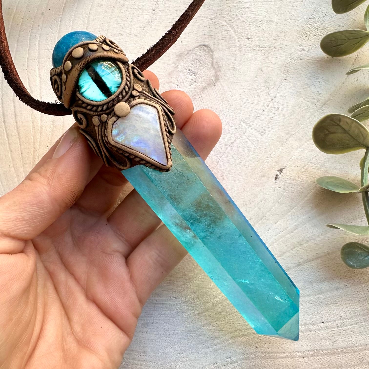 Aqua aura quartz point with blue apatite and rainbow moonstone eye wand pendant