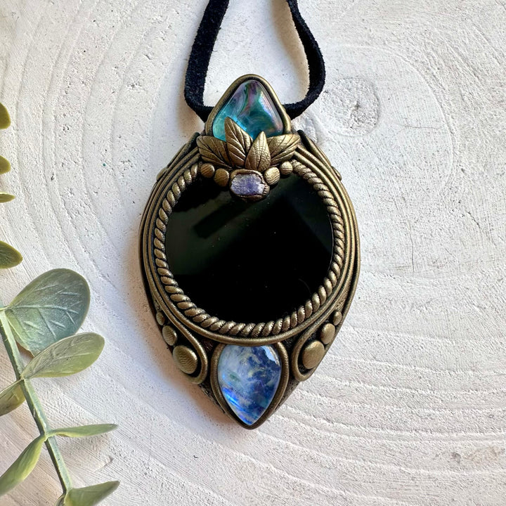 Handmade healing crystal pendant featuring Black Obsidian Mirror and genuine natural gemstones.
