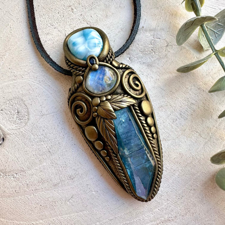 Unique altar tool crystal necklace with shimmering Aqua Aura Quartz, ocean-blue Larimar and iridescent Moonstone.