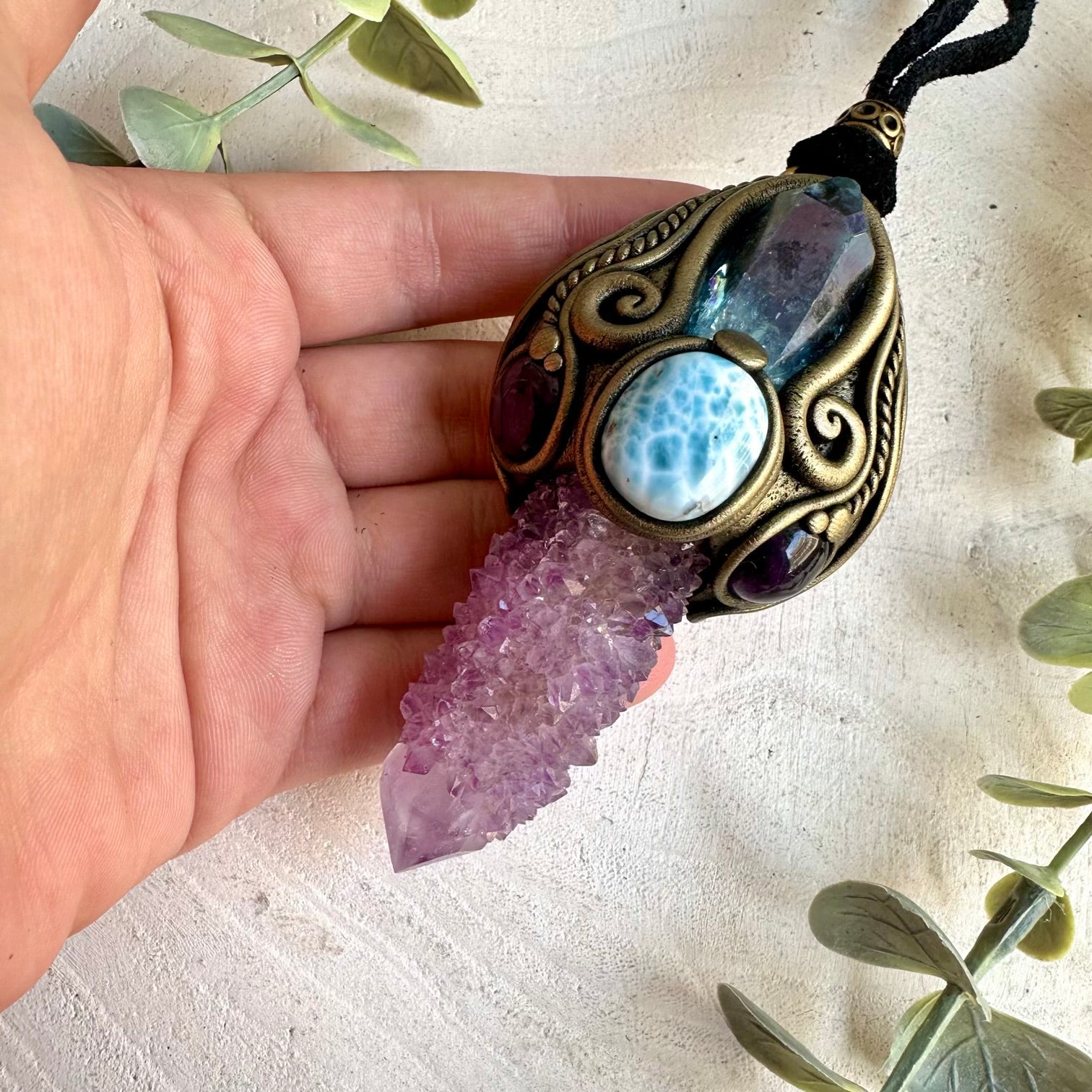 Handmade Spirit Quartz healing crystal wand and pendant necklace featuring Aqua Aura Quartz, Amethyst and Larimar. A one of a kind spiritual energy tool combining sparkling crystal formations with luminous blue and purple gemstones, created for meditation, energy work, intention setting and personal spiritual practice.