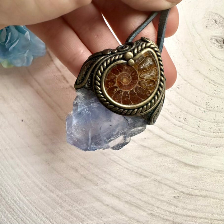 Light Blue Fluorite and Ammonite spiral fossil pendant on adjustable cord, unique spiritual jewelry.