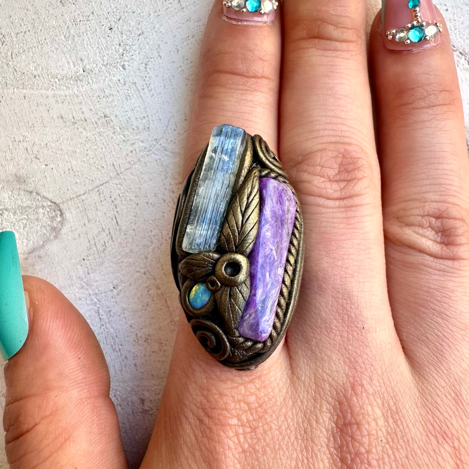 Aquamarine with charoite and Australian opal ring
