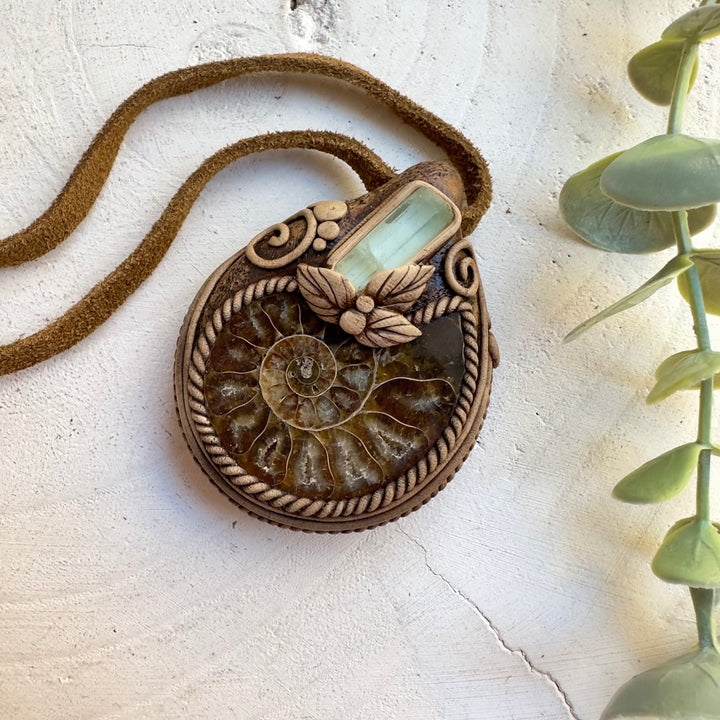 Handmade ammonite pendant necklace with aquamarine crystal