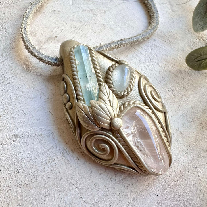 Natural gemstone pendant with blue Aquamarine, translucent Danburite and sparkling Topaz.