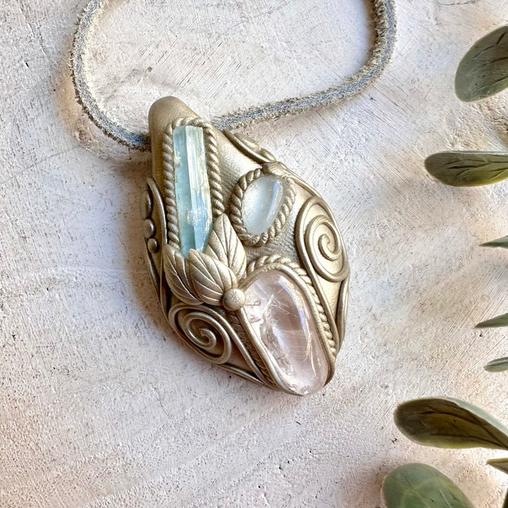 One of a kind handmade necklace combining calming blue Aquamarine with luminous white gemstones.