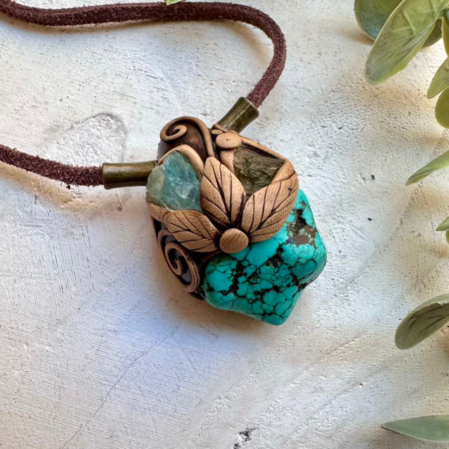 Unisex spiritual necklace featuring turquoise aquamarine and moldavite