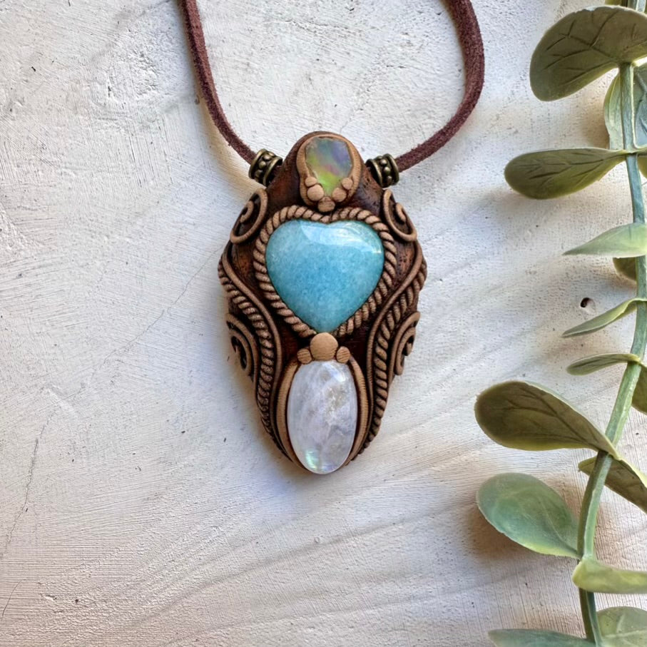 Handmade necklace featuring aquamarine moonstone and raw Ethiopian opal