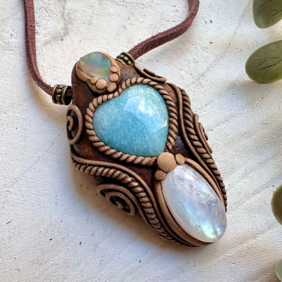 Healing gemstone necklace combining aquamarine moonstone and raw opal