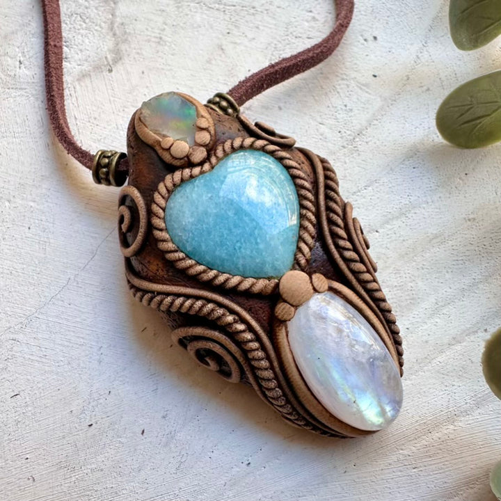 Healing gemstone necklace combining aquamarine moonstone and raw opal