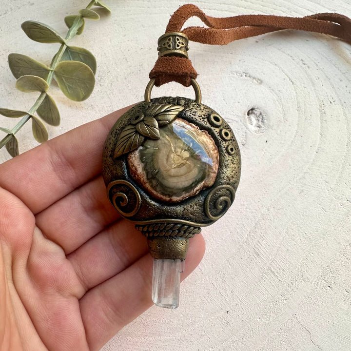 Healing crystal pendant necklace featuring Aquamarine and Petrified Wood
