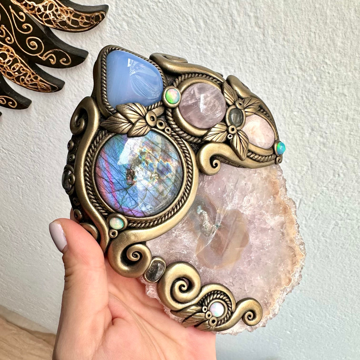 Natural Amethyst Stalactite surrounded by Blue Chalcedony, Rose Quartz and Clear Topaz in handmade gemstone wall decor.