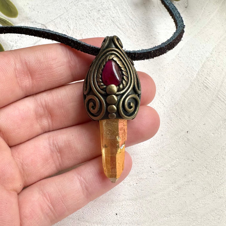 Witchy crystal necklace with Sunset Aura Quartz and Rhodolite Garnet talisman pendant for mystical energy work.