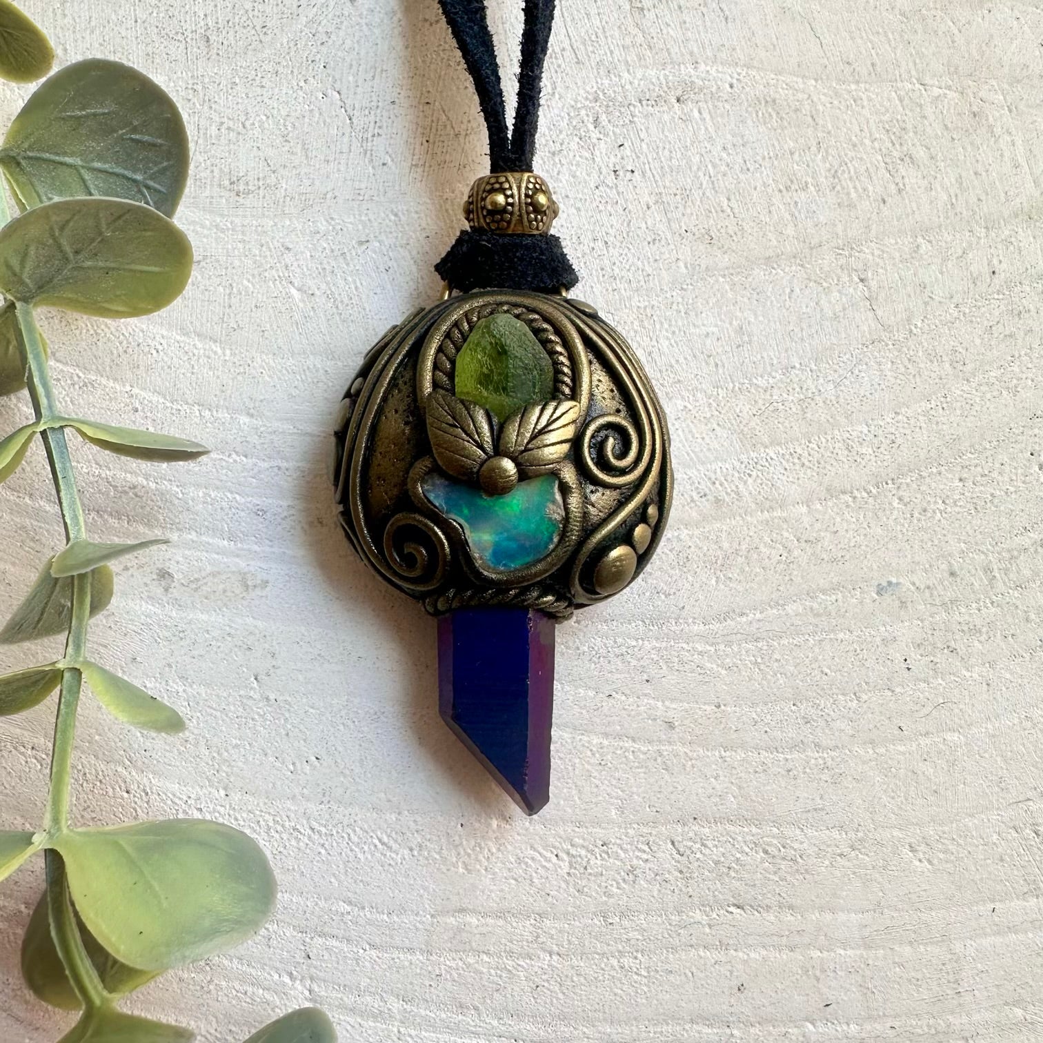 One of a kind crystal necklace handcrafted with Cobalt Aura Quartz and genuine Ethiopian Opal.