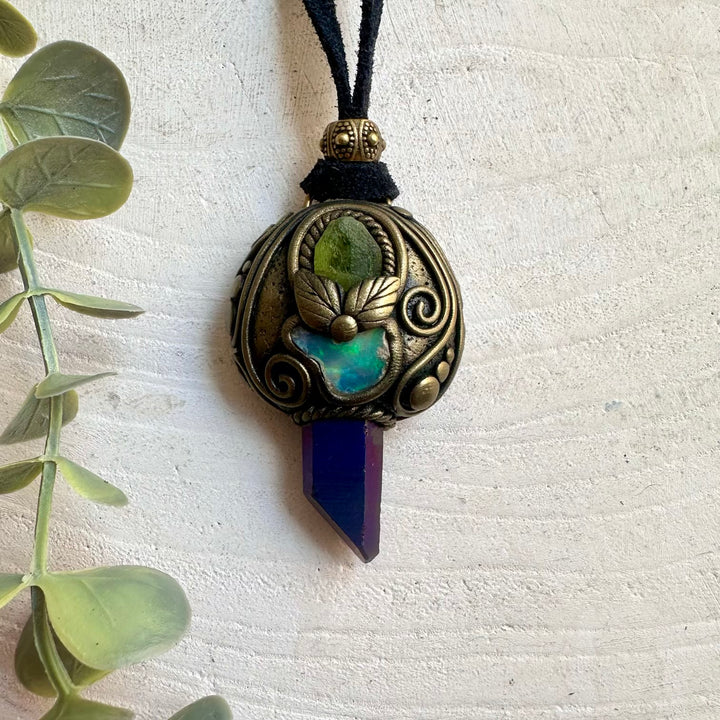 One of a kind crystal necklace handcrafted with Cobalt Aura Quartz and genuine Ethiopian Opal.